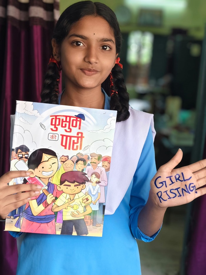 A Girl Reading Girl Rising Comic Book on Kusum's Adventurous Innings